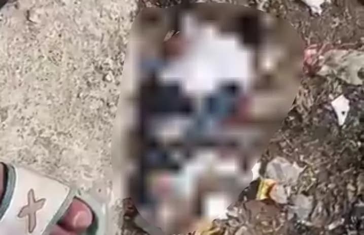 क़ूडे के ढेर के पास औंधे मुह पड़ा मिला युवक का शव ,हत्या की आशंका
